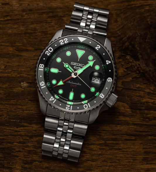 Seiko 5 GMT stainless steel Black Dial black Bezel  watch